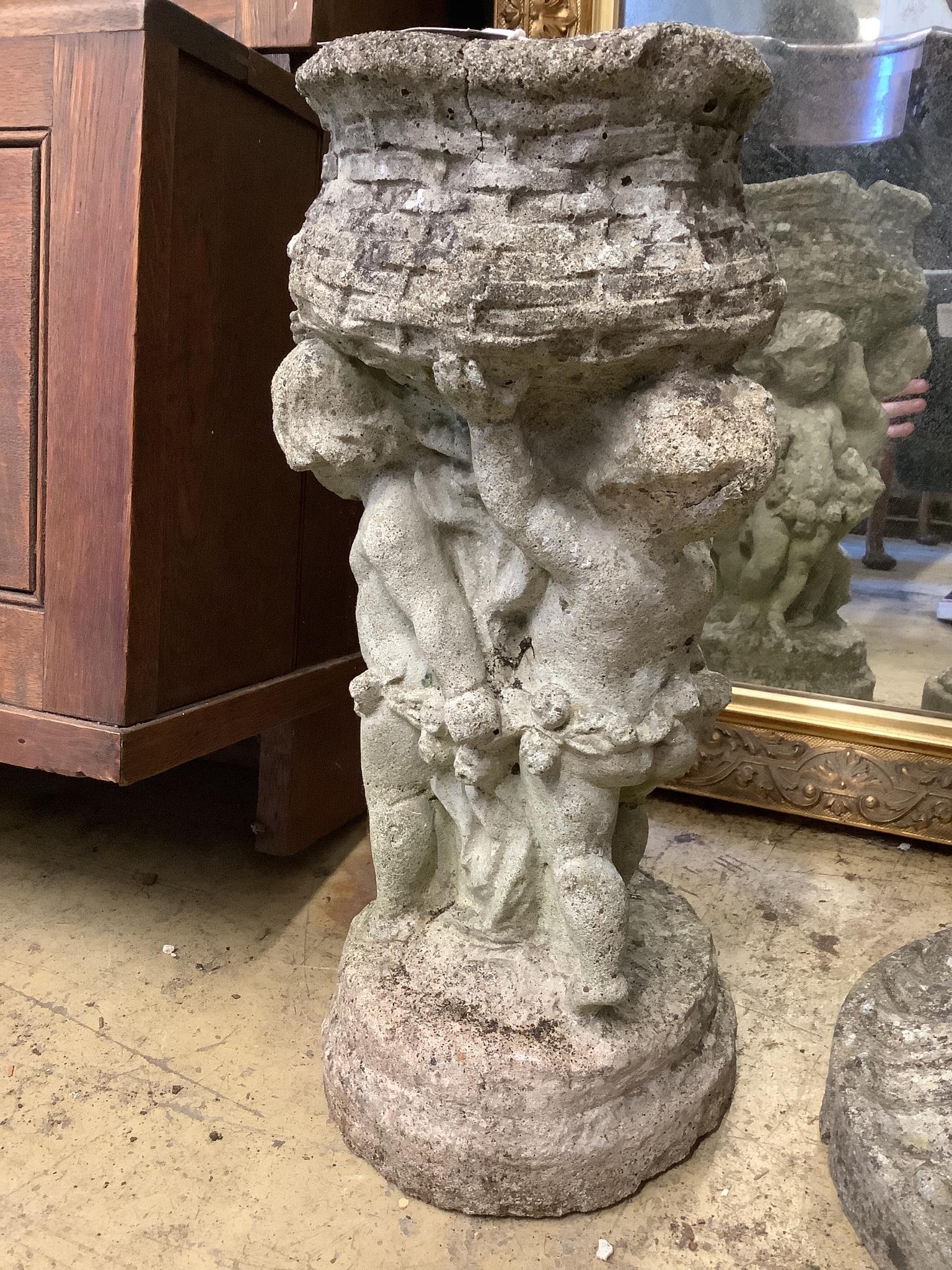 A reconstituted stone garden bird bath, height 42cm